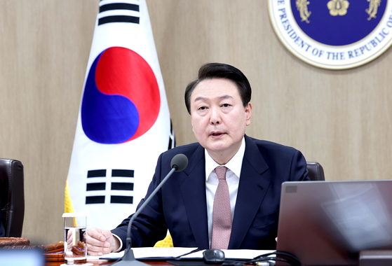 President Yoon Suk Yeol speaks on the normalization of Korea-Japan relations at a Cabinet meeting held at the presidential office in Yongsan, central Seoul, Tuesday. [JOINT PRESS CORPS]