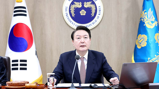 President Yoon Suk Yeol speaks on the normalization of Korea-Japan relations at a Cabinet meeting held at the presidential office in Yongsan, central Seoul, Tuesday. [JOINT PRESS CORPS]