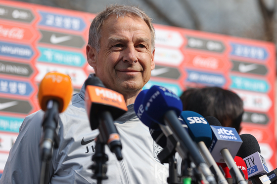 Jurgen Klinsmann speaks to reporters ahead of his first training with the Korean national team at the Paju National Football Center in Paju, Gyeonggi on Monday. [YONHAP] 