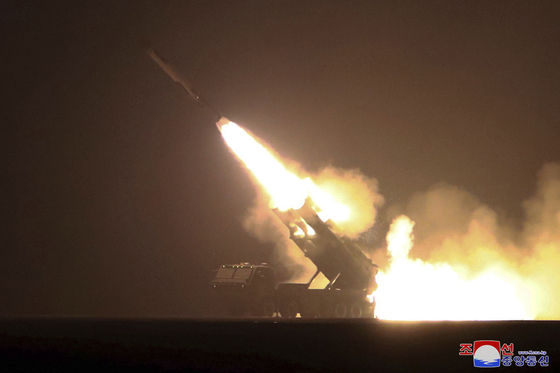 North Korea launches a cruise missile on Feb. 23 in a photo released by its official Korean Central News Agency. [YONHAP]