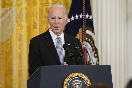 U.S. President Joe Biden speaks in the East Room of the White House in Washington Monday. [AP/YONHAP]