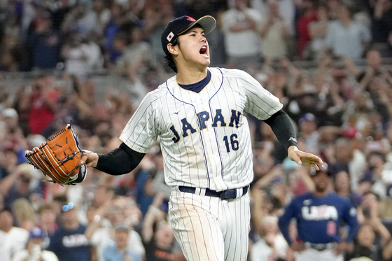 Shohei Ohtani of Japan reacts after the final out of the World Baseball Classic, defeating the United States 3-2 at LoanDepot Park on Tuesday in Miami, Florida.  [AFP/YONHAP]
