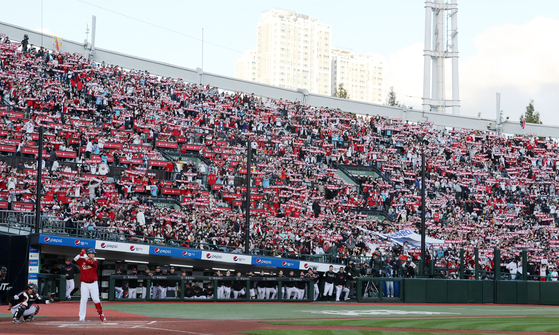 Fans watch a game between the Lotte Giants and the LG Twins at Sajik Baseball Stadium in Busan on Oct. 8, 2022.  [NEWS1]