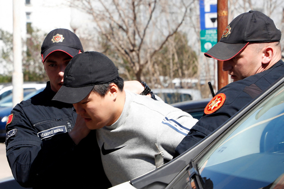 Terraform Labs co-founder Do Kwon is taken to court after being arrested in Montenegro on March 24. [AFP/YONHAP]