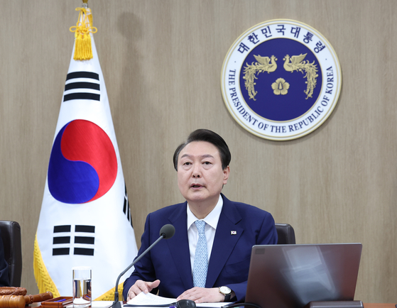 President Yoon Suk Yeol presides over a Cabinet meeting at the Yongsan presidential office in central Seoul on Tuesday. [JOINT PRESS CORPS]