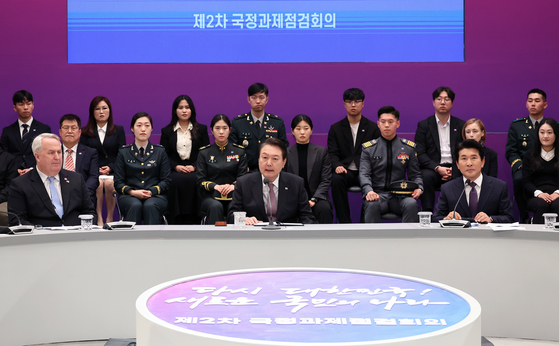 President Yoon Suk Yeol speaks at the second policy review meeting, focusing on diplomatic and security affairs, at the Blue House in central Seoul on Wednesday. [JOINT PRESS CORPS]