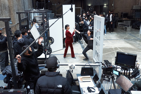 Jeon Do-yeon on the set of "Kill Boksoon" filming an action scene [NETFLIX]