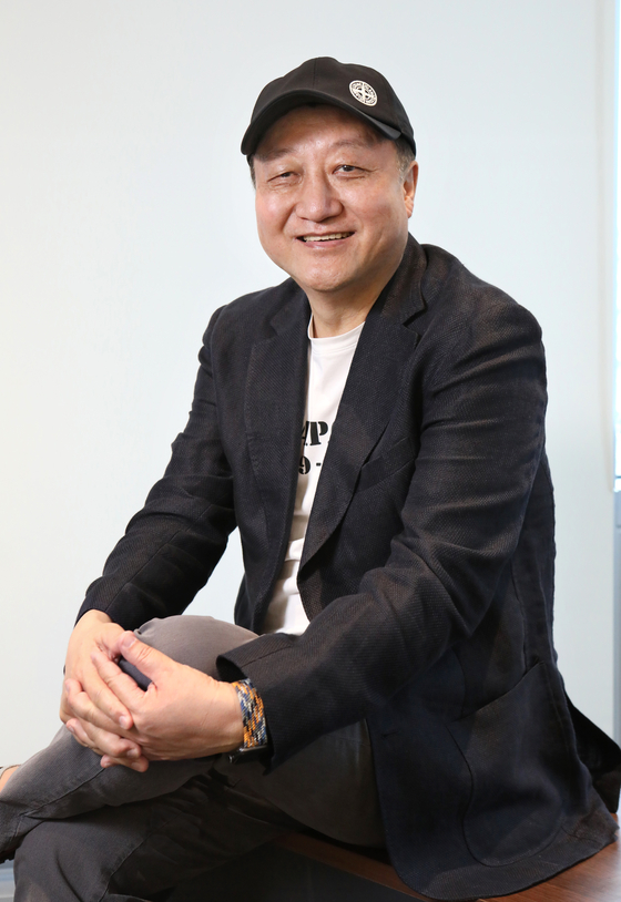Co-director of Jeonju International Film Festival Min Sung-wook poses for a photo during an interview with the Korea JoongAng Daily in Mapo District, western Seoul on April 5, 2023. [PARK SANG-MOON]