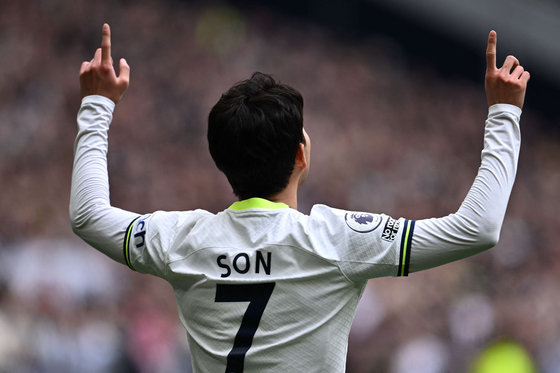 Tottenham Hotspur's Son Heung-min celebrates after scoring the 100th goal of his Premier League career during a match against Brighton and Hove Albion at Tottenham Hotspur Stadium in London on Saturday. With the goal, Son became the first Asian footballer ever to reach a Premier League century.  [AFP/YONHAP]