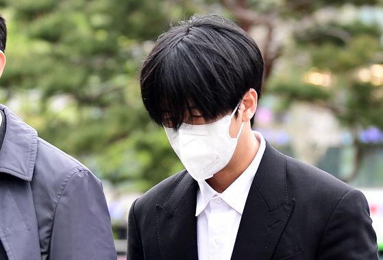 Rapper Ravi attends the Seoul Southern District Court on Tuesday. [NEWS1]