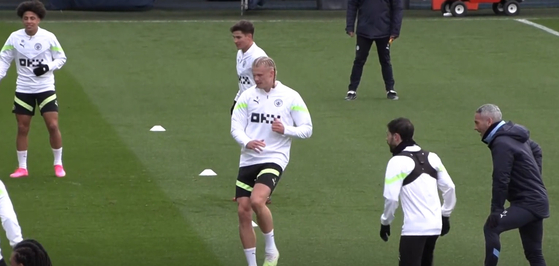 Erling Haaland, center, trains with the Manchester City squad ahead of the clash with Bayern Munich in the Champions League quarter-final on Tuesday. 