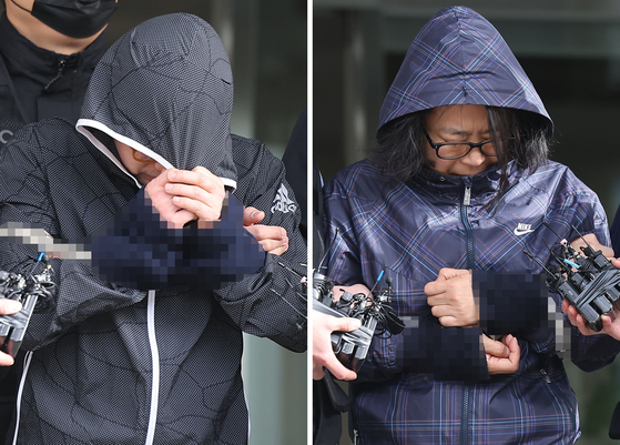Suspects Yoo Sang-won, left, and Hwang Eun-hee, who allegedly masterminded the kidnapping and murder of a woman in Gangnam District, southern Seoul, leave Suseo Police Precinct in Gangnam on Thursday to be referred to prosecutors. [YONHAP]