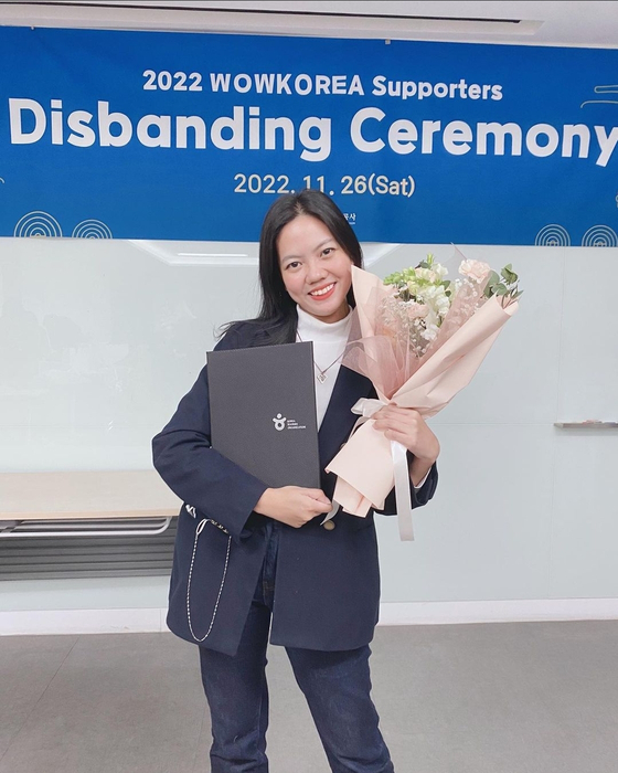 Dawn Naval, a participant in the 2022 Wow Korea Supporters program, poses during the closing ceremony last year. [DAWN PATRICE JAMILA NAVAL]