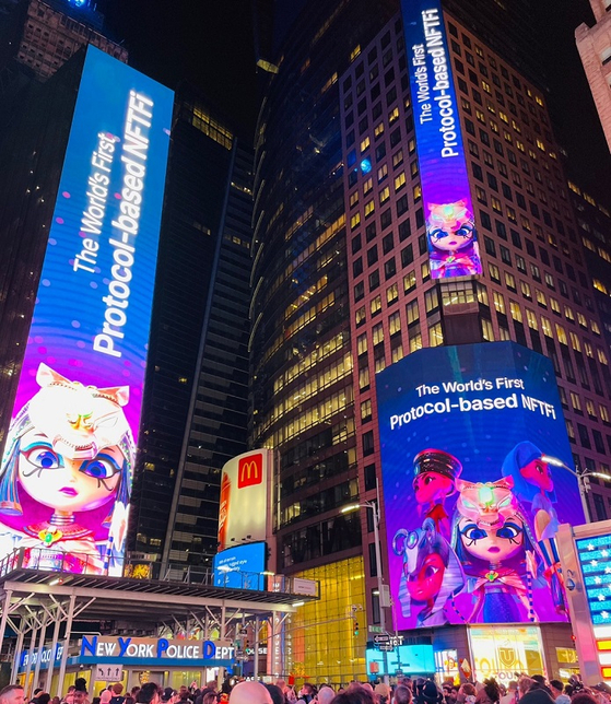 Advertisements for game publisher Wemade’s non-fungible token (NFT) service “NEITH Station” are displayed in Times Square in New York on Wednesday. Wemade participates in the world’s biggest NFT conference “NFT NYC 2023” from Wednesday to Friday as a sponsor and to introduce its NFT service. [WEMADE]