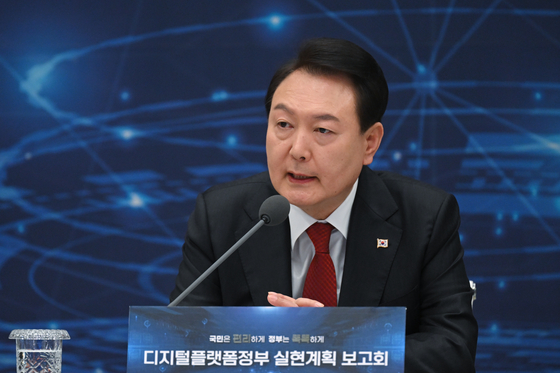 President Yoon Suk Yeol speaks during a debriefing session held at the Blue House's Yeongbingwan state guest house in central Seoul on Friday. [OFFICE OF THE PRESIDENT]