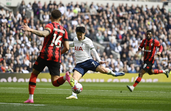 Tottenham Hotspur's Son Heung-min scores his side's first goal against Bournemouth in a Premier League match at Tottenham Hotspur Stadium in London on Saturday. [REUTERS/YONHAP]