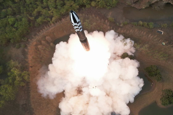 A photo released on Friday by Pyongyang's state-controlled Rodong Sinmun shows the launch of what state media called a new Hwasong-18 solid-fuel intercontinental ballistic missile the previous day. [NEWS1]