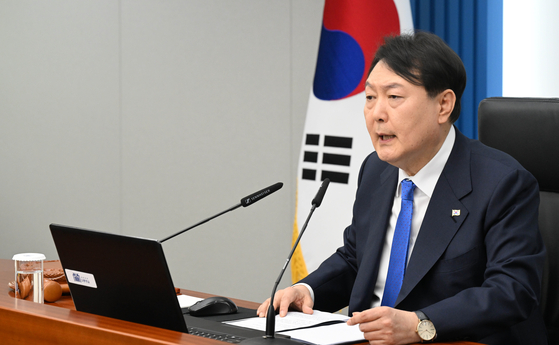 President Yoon Suk Yeol speaks on jeonse fraud, which has become a major social concern, during a Cabinet meeting at the Yongsan presidential office in central Seoul on Tuesday. [JOINT PRESS CORPS]