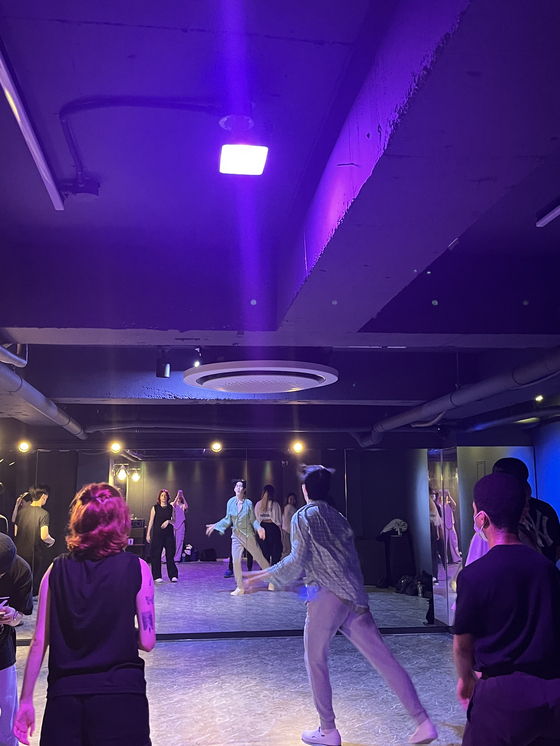Students practice choreography in a dance practice room they rented together. [SOFIA DEL FONSO]