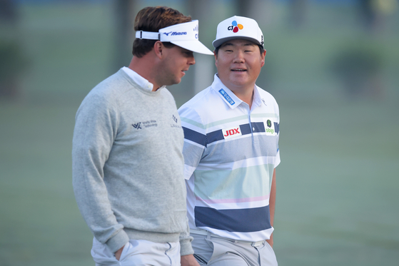 Im Sung-jae and Keith Mitchell react during the pro-am prior to the Zurich Classic of New Orleans at TPC Louisiana on April 19 in Avondale, Louisiana.  [GETTY IMAGES]