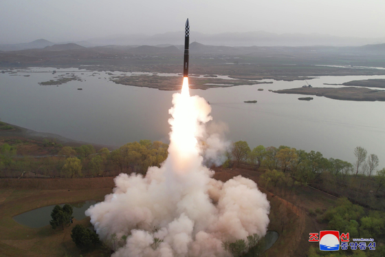 North Korea carries out its first test of a solid-fuel intercontinental ballistic missile (ICBM) on April 13. [KOREAN CENTRAL NEWS AGENCY]