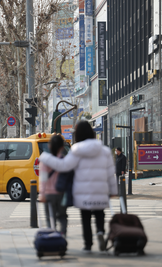 A street in a hagwon-packed neighborhood of Daechi-dong of Gangnam District, southern Seoul, on March 7. Korea's spending on private education peaked at 26 trillion won last year. [YONHAP] 