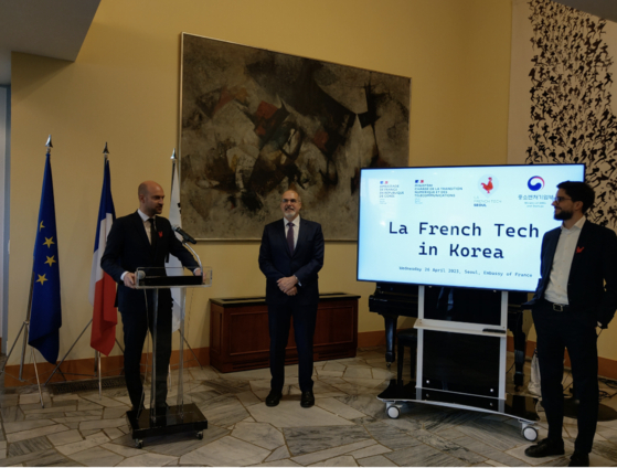French Minister of State for Digital Transition and Telecommunications Jean-Noel Barrot, left, and French Ambassador to Korea Philip Lefort, center, speak with the press at the diplomatic residence in Seoul on Wednesday about the country's latest technology cooperation with Korea including the 2023 edition of Vivatech in Paris where Korea will be “Country of the Year.″ [EMBASSY OF FRANCE IN KOREA]