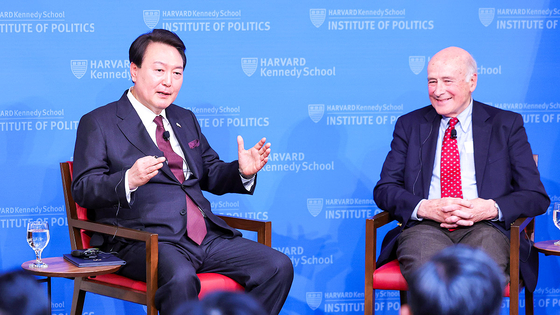 Korean President Yoon Suk Yeol, left, speaks during a talk event with Joseph Nye, professor emeritus at Harvard University, at the Harvard Kennedy School in Cambridge on Friday. [JOINT PRESS CORPS] 