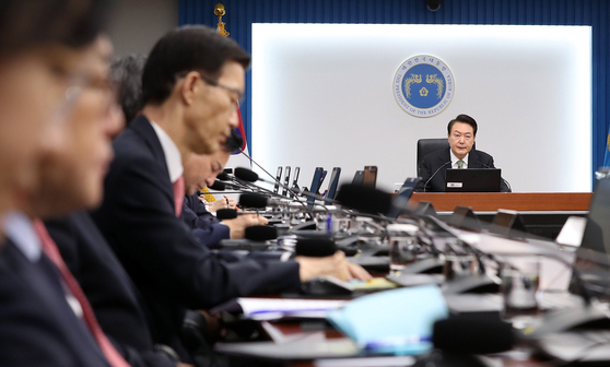 President Yoon Suk Yeol presides the Cabinet meeting at the Yongsan presidential office on Tuesday. [YONHAP]