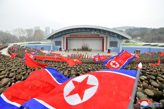 A throng of North Korean youths hold a protest rally at a theater in Pyongyang on March 22, over the joint military exercises between South Korea and the United States conducted then. [KOREAN CENTRAL NEWS AGENCY]