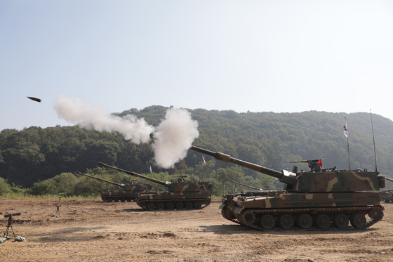 K-9 Thunder self-propelled howitzers participate in a live fire exercise at a firing range in Paju, Gyeonggi, on Sept. 30, 2022. [REPUBLIC OF KOREA ARMY]