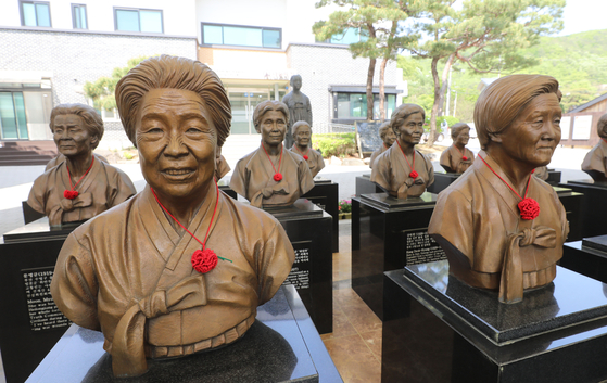 Statues representing Korean victims of Japanese wartime sexual slavery stand at a community center for the victims in Gwangju, Gyeonggi, on Wednesday. Each statue has been made posthumously for the victims. [NEWS1] 