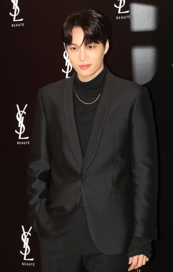 Who is Exo's Kai and when is he joining the military?