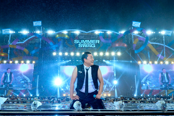 Singer PSY performs during the ″Summer Swag 2022″ concert in Seoul, as featured in the Disney+ documentary ″PSY Summer Swag 2022.″ [WALT DISNEY COMPANY KOREA]