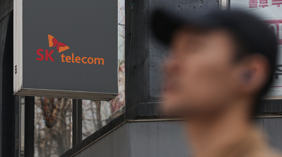 SK Telecom logo at a company branch in Seoul [YONHAP]