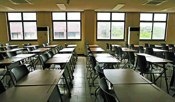 An empty classroom at a university. [NEWS1]