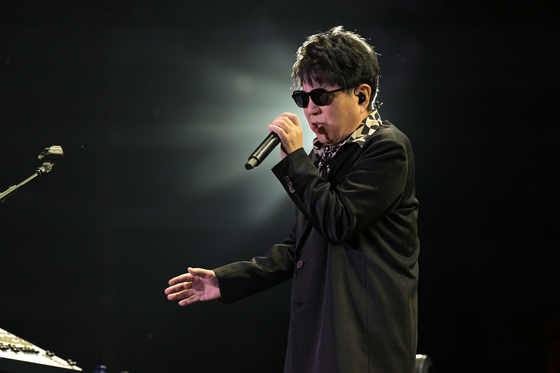 Veteran singer Cho Yong-pil performs at Olympic Stadium in southern Seoul on Saturday [INSIGHT ENTERTAINMENT]