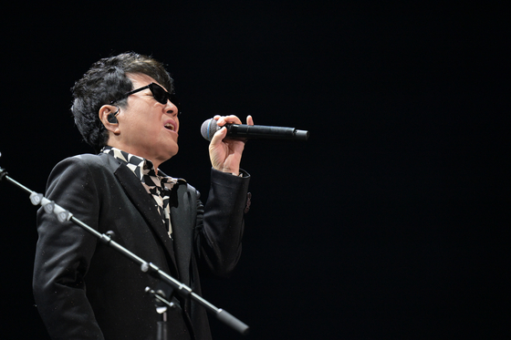 Veteran singer Cho Yong-pil performs at Olympic Stadium in southern Seoul on Saturday [INSIGHT ENTERTAINMENT]
