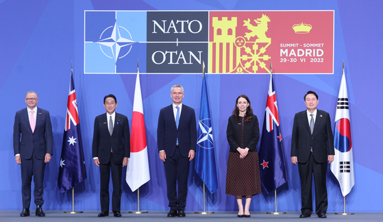 President Yoon Suk Yeol, first from right, poses for a photo with other leaders of Asia-Pacific nations and the chief of NATO during a NATO summit in Spain on June 29, 2022. [YONHAP]