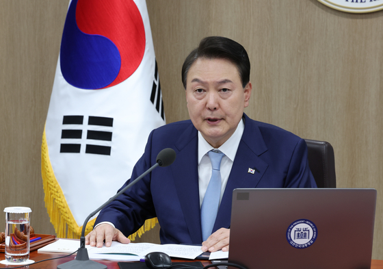 President Yoon Suk Yeol presides over a Cabinet meeting at the Yongsan presidential office in central Seoul on Tuesday. [JOINT PRESS CORPS]