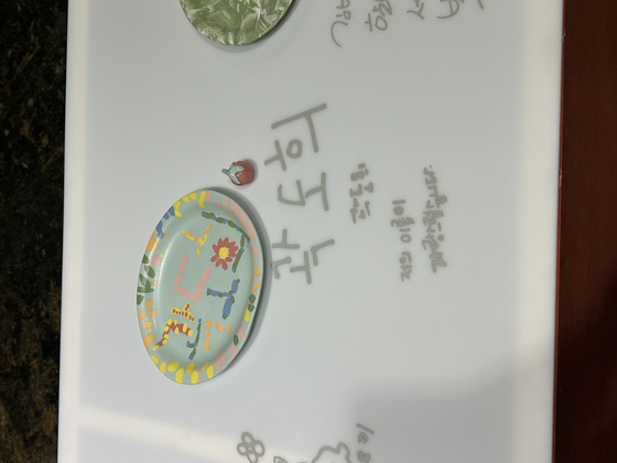 Another ceramic plate made by one of 60 children for the "Twinkle Twinkle Little Hands" exhibition, as part of Korea Craft Week 2023. The description reads, "I am proud of my name." [SHIN MIN-HEE]