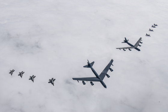 Korean and U.S. Air Forces stage air drills, involving a B-52H strategic bomber, F-35A fighters and F-16 fighters, over the Korean Peninsula on April 14. [MINISTRY OF NATIONAL DEFENSE]
