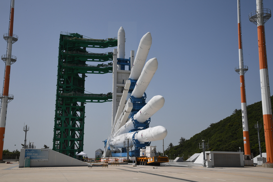 In this overlay photo, Korea Space Launch Vehicle-II, also known as Nuri, is being erected in a vertical position before the launch scheduled for Wednesday, at the Naro Space Center in Goheung County, South Jeolla, on Tuesday. [KARI]