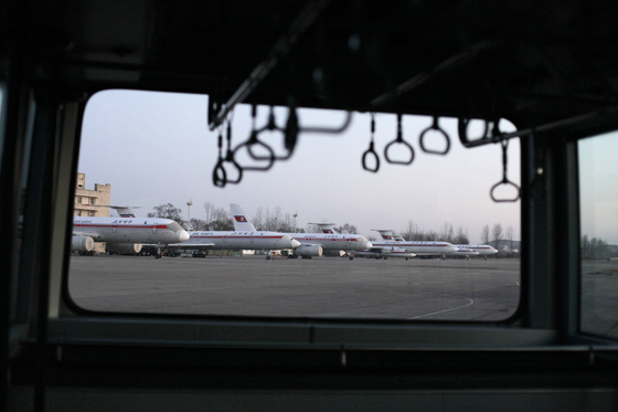 A fleet of Air Koryo aircraft are seen on the tarmac at Sunan International Airport in Pyongyang, North Korea, on Dec. 19, 2011. [AP/YONHAP]