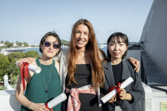 From left, directors Zineb Wakrim, Marlene Emilie Lyngstad and Hwang Hye-in pose for a photo after receiving La Cinef awards at the Cannes International Film Festival in Cannes, France on Thursday. [CANNES]