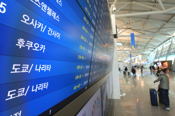 Departure information for flights to Japan is displayed on the monitor at Incheon International Airport. [NEWS1]