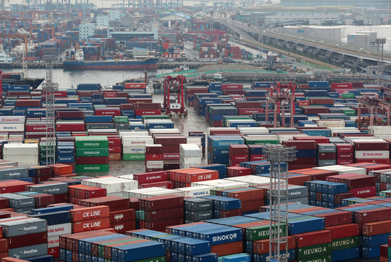Containers stacked up at a port in Busan on Thursday. [NEWS1]