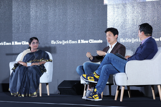 Kim Hyung-san, center, the founder and CEO of The Swing, speaks during a panel discussion in The New York Times, A New Climate event held in Busan on May 26. [PARK SEONGGWAN]