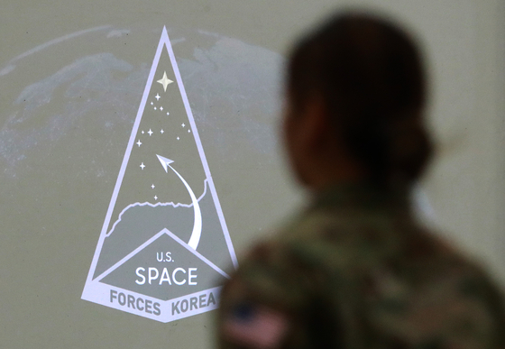 The insignia of the United States Space Forces Korea can be seen in this photograph taken of the command's establishment at a ceremony held on Osan Air Base in Pyeongtaek, Gyeonggi, on Dec. 14. [JOINT PRESS CORPS] 