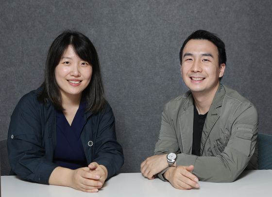 4DX producer at CGV Lee Ji-hye, left, and ScreenX prodcuer Oh Yoon-dong pose for a photo at the CGV Yongsan office in central Seoul on March 16. [PARK SANG-MOON]